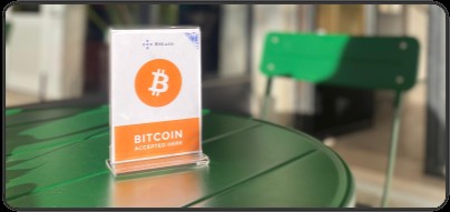 Bitcoin accepted here em café