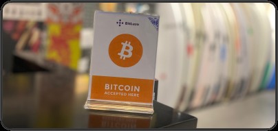 Bitcoin accepted here em loja